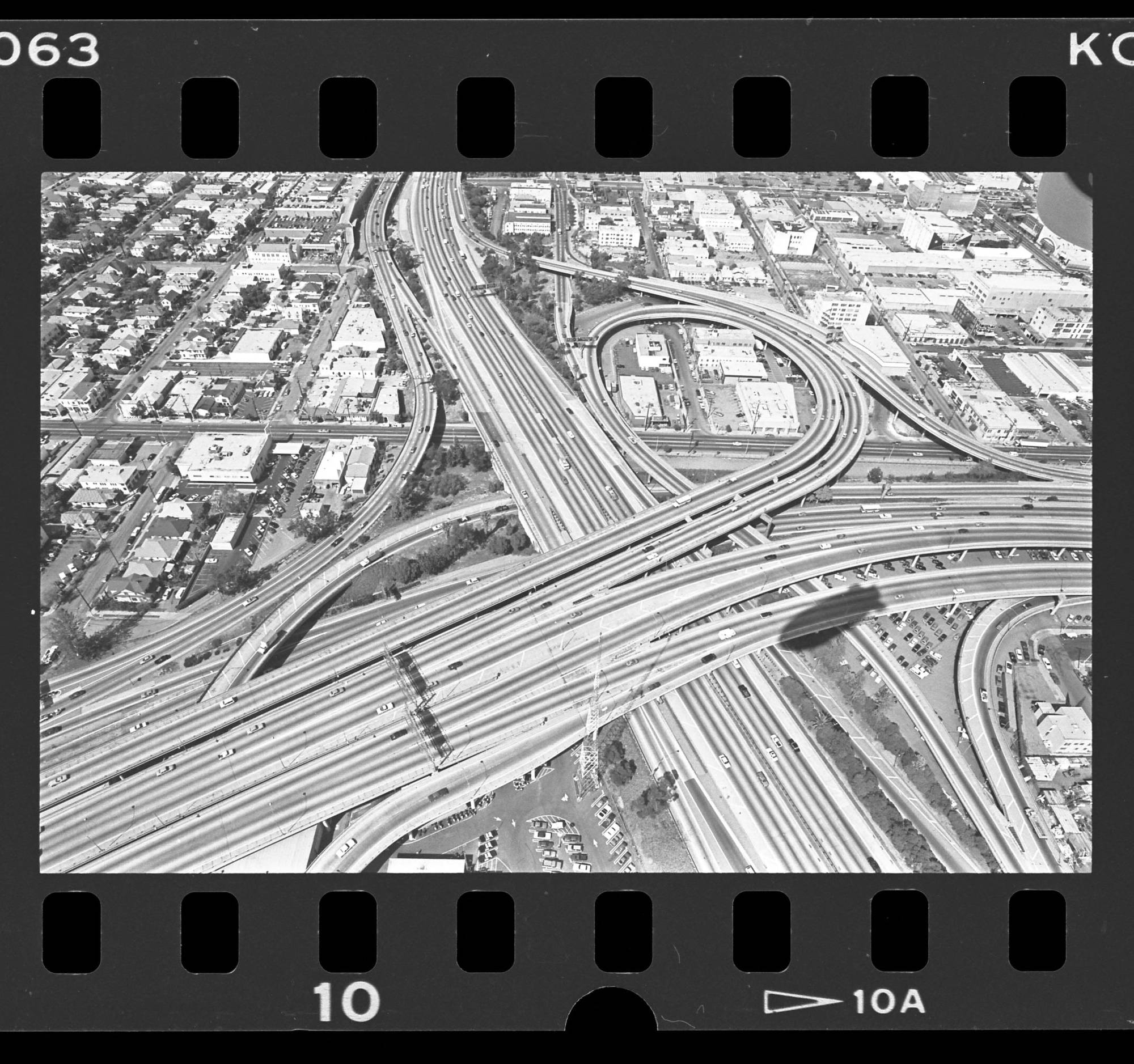 View from dirigible [blimp] of interchange of the Santa Monica and Harbor Freeways in Los Angeles, 1986