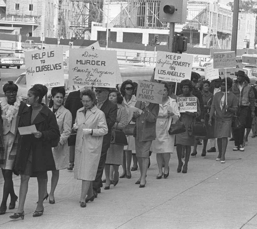 Los Angeles area anti-poverty workers picketing Federal Building in protest over funding cuts, 1966.